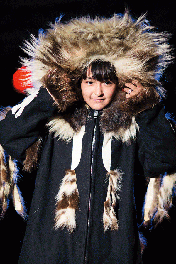 Anastazia Cockney in the Inuvialuit Settlement Region wearing a fur-trimmed parka.